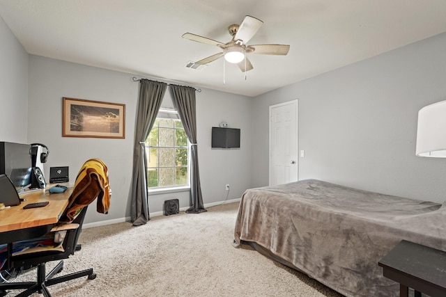 10503 Minturn Ln, Houston, TX 77064 - carpeted bedroom featuring an office area, baseboards, and ceiling fan