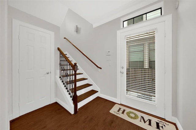 2609 Riverside Dr Unit C, Houston, TX 77004 - foyer entrance with dark wood-style flooring, baseboards, and stairway