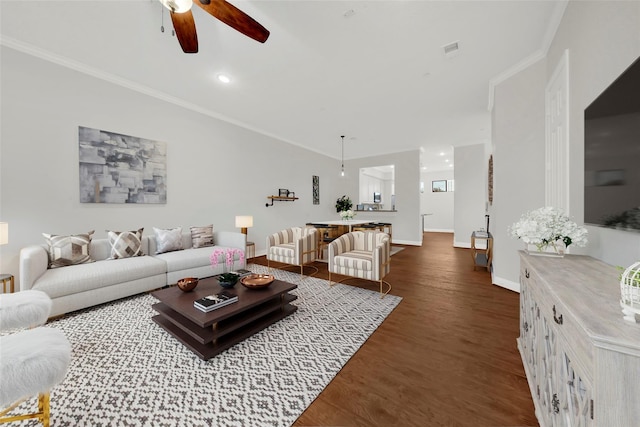 2609 Riverside Dr Unit C, Houston, TX 77004 - living area with ceiling fan, dark wood-style flooring, baseboards, and crown molding
