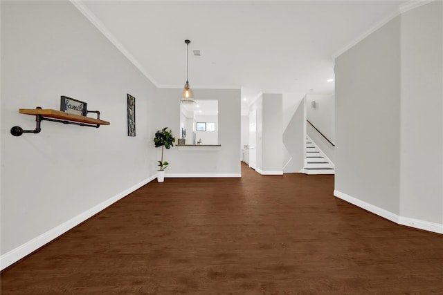 2609 Riverside Dr Unit C, Houston, TX 77004 - unfurnished living room featuring ornamental molding, baseboards, dark wood finished floors, and stairs