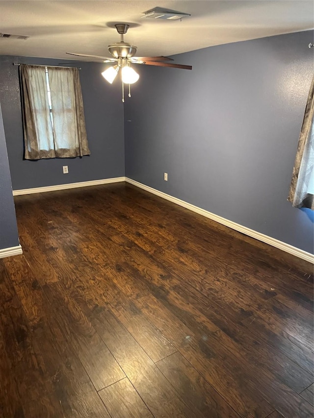 309 Aycock St, Clute, TX 77531 - spare room with a ceiling fan, wood finished floors, and baseboards