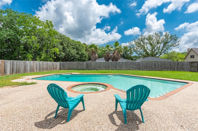 1402 Osborne Dr, Friendswood, TX 77546 - view of swimming pool featuring an in-ground hot tub and a patio
