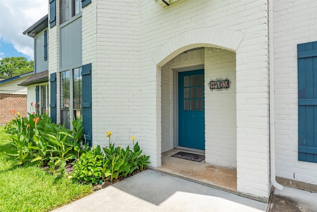 1402 Osborne Dr, Friendswood, TX 77546 - view of exterior entry with brick siding