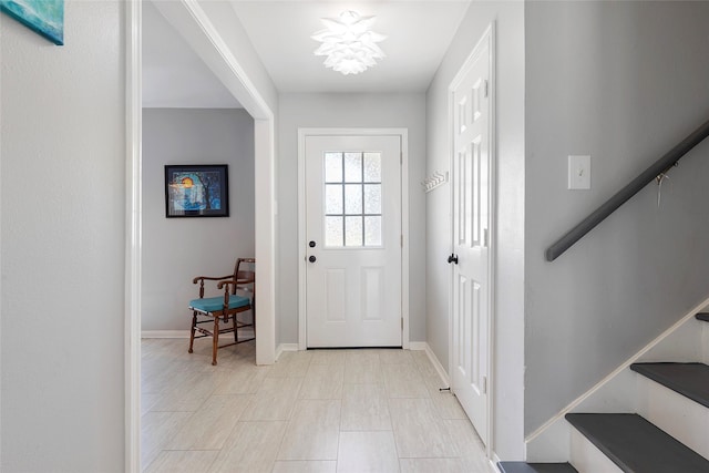 1402 Osborne Dr, Friendswood, TX 77546 - entrance foyer featuring stairs and baseboards