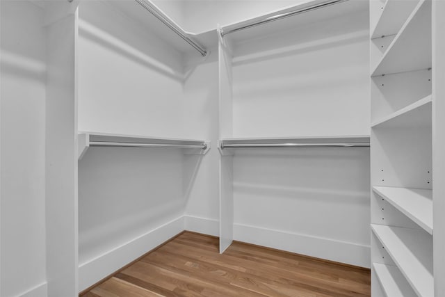 904 Willard St, Houston, TX 77006 - walk in closet with wood finished floors