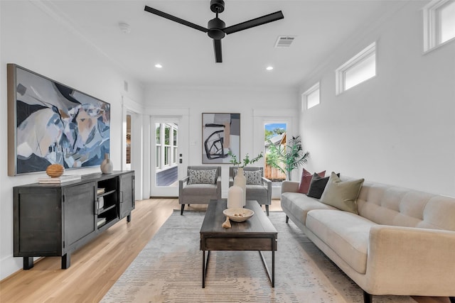 904 Willard St, Houston, TX 77006 - living area featuring a ceiling fan, light wood-style floors, recessed lighting, and crown molding