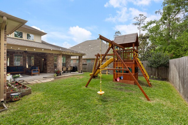 2678 Granite River Ln, Conroe, TX 77385 - view of jungle gym featuring a patio area