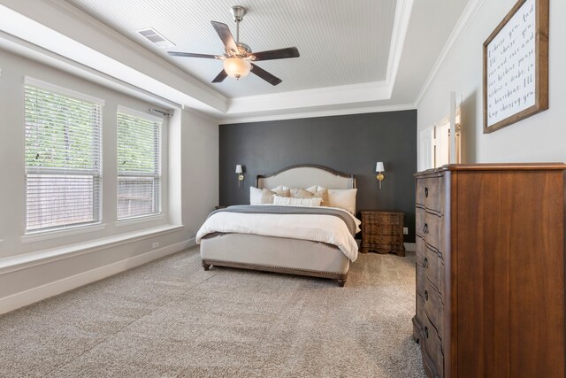 2678 Granite River Ln, Conroe, TX 77385 - bedroom with a raised ceiling, carpet flooring, crown molding, and ceiling fan