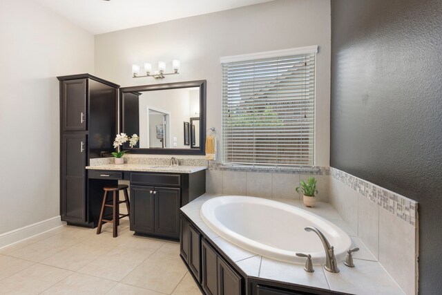 2678 Granite River Ln, Conroe, TX 77385 - full bath featuring vanity, a garden tub, tile patterned floors, and a chandelier