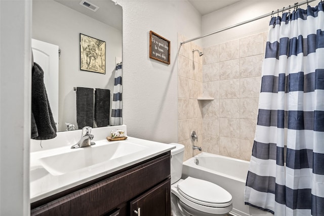 20382 Green Mountain Dr, New Caney, TX 77357 - bathroom featuring toilet, vanity, and shower / bath combo with shower curtain