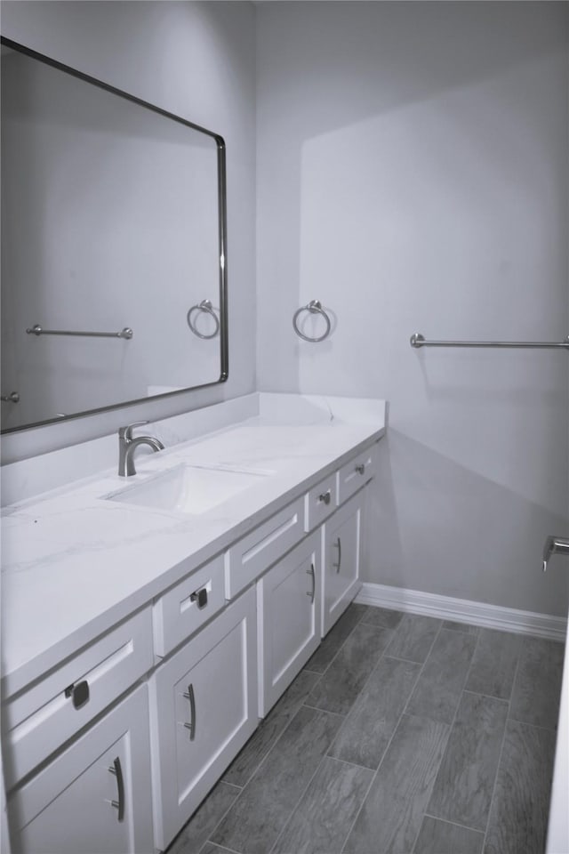 10011 Sageorchard Ln, Houston, TX 77089 - bathroom featuring vanity and baseboards