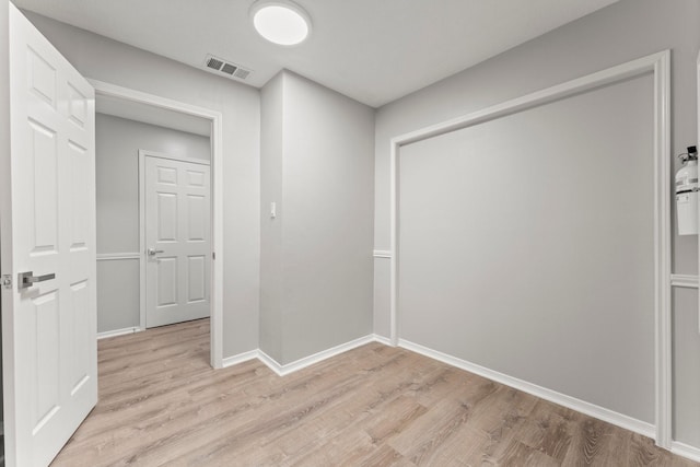 235 E Rainbow Ridge Cir, The Woodlands, TX 77381 - hall with light wood-style floors
