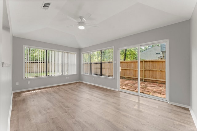 235 E Rainbow Ridge Cir, The Woodlands, TX 77381 - unfurnished room with a ceiling fan, wood finished floors, and vaulted ceiling