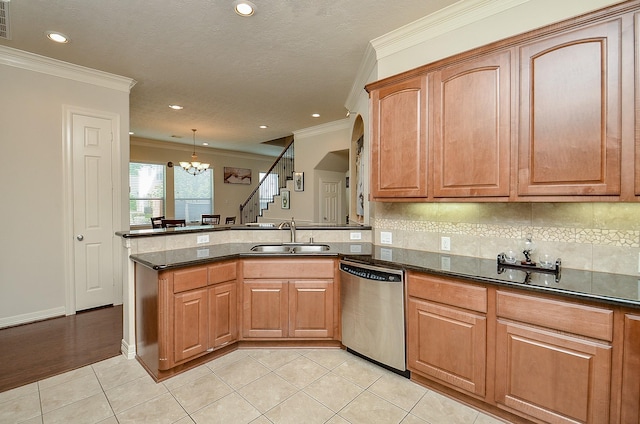 2918 Royal Oaks Grn, Houston, TX 77082 - kitchen with stainless steel dishwasher, a sink, a chandelier, a peninsula, and crown molding