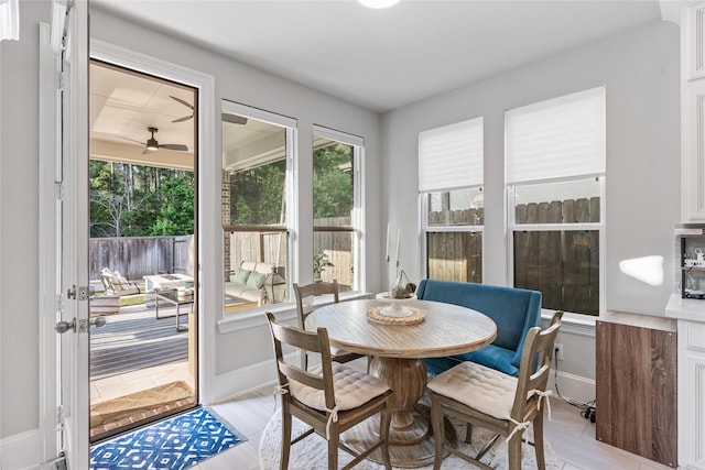 271 Bronze View Dr, Montgomery, TX 77316 - dining room with a ceiling fan and baseboards