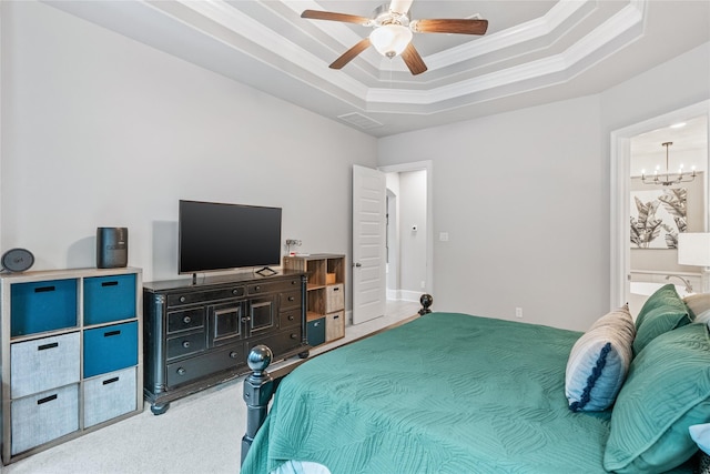 271 Bronze View Dr, Montgomery, TX 77316 - carpeted bedroom featuring a raised ceiling, ornamental molding, a chandelier, a ceiling fan, and ensuite bathroom