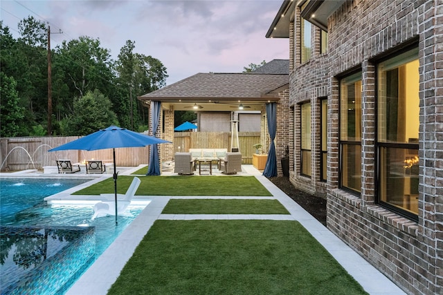 271 Bronze View Dr, Montgomery, TX 77316 - view of yard featuring outdoor lounge area, a patio area, and a pool with connected hot tub