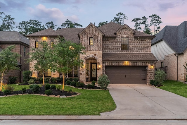 271 Bronze View Dr, Montgomery, TX 77316 - french provincial home with an attached garage, brick siding, driveway, a lawn, and a shingled roof