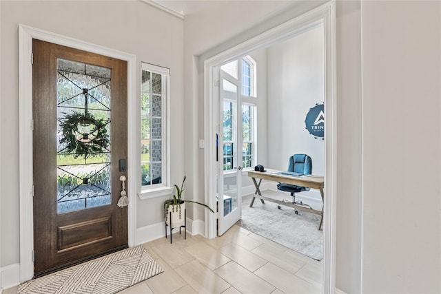 271 Bronze View Dr, Montgomery, TX 77316 - entrance foyer with baseboards and light tile patterned floors