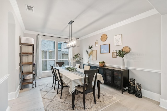 271 Bronze View Dr, Montgomery, TX 77316 - dining room featuring crown molding, a chandelier, and baseboards