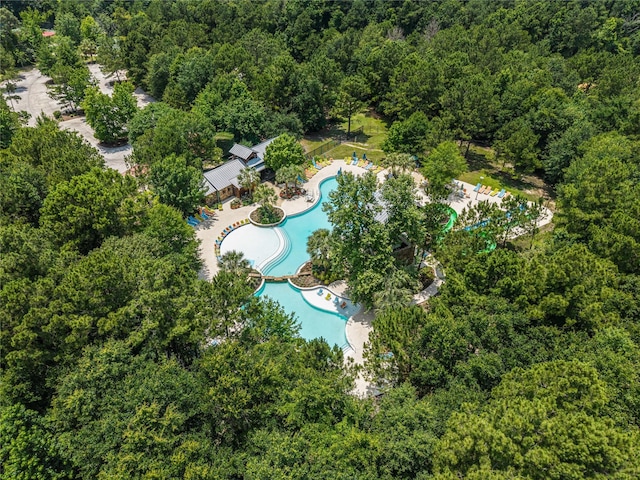 271 Bronze View Dr, Montgomery, TX 77316 - drone / aerial view of a heavily wooded area and a pool