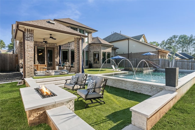 271 Bronze View Dr, Montgomery, TX 77316 - view of pool featuring an outdoor living space with a fire pit, a ceiling fan, and a patio area