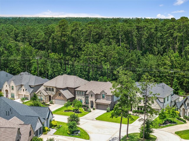 271 Bronze View Dr, Montgomery, TX 77316 - aerial perspective of suburban area with a forest