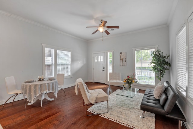 615 Allston St, Houston, TX 77007 - living area featuring dark wood-style flooring, a ceiling fan, ornamental molding, and baseboards