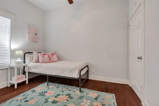 615 Allston St, Houston, TX 77007 - bedroom with wood finished floors, baseboards, and multiple windows