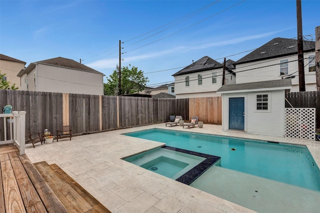 615 Allston St, Houston, TX 77007 - view of swimming pool with a fenced backyard, a pool with connected hot tub, and a patio