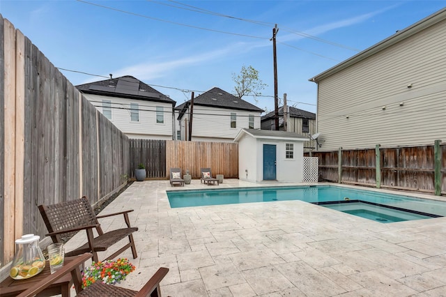 615 Allston St, Houston, TX 77007 - view of pool featuring a patio, a fenced backyard, and a pool with connected hot tub