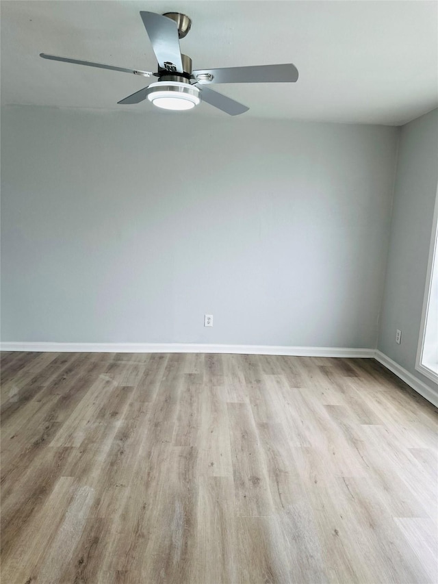 312 Bridal Wreath Ave, Orange, TX 77630 - empty room featuring wood finished floors, ceiling fan, and baseboards