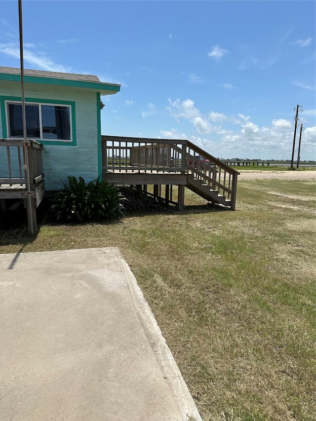 27314 Fm 457, Sargent, TX 77414 - view of green lawn with a wooden deck