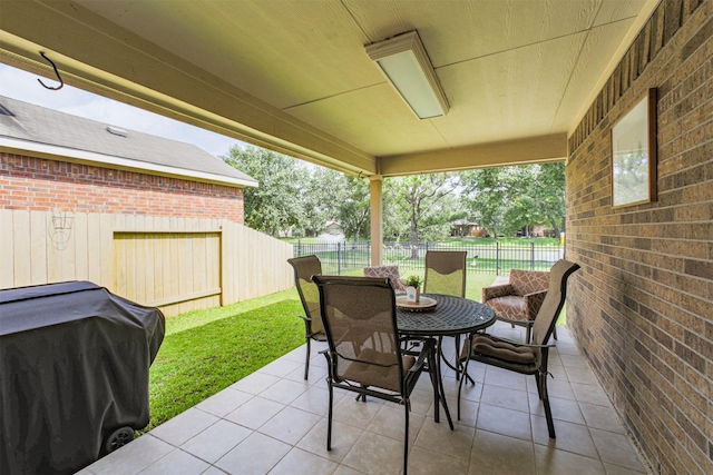 9609 Landon Lake Dr, Pearland, TX 77584 - view of patio with outdoor dining area and grilling area