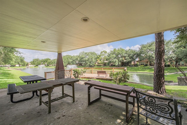 9609 Landon Lake Dr, Pearland, TX 77584 - view of patio featuring a water view