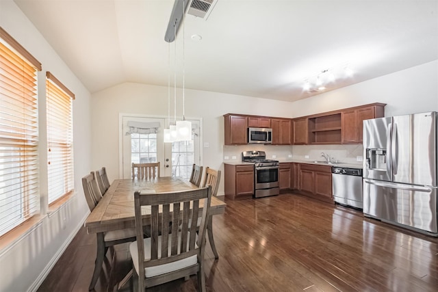9609 Landon Lake Dr, Pearland, TX 77584 - kitchen featuring stainless steel appliances, open shelves, dark wood-style flooring, vaulted ceiling, and a sink