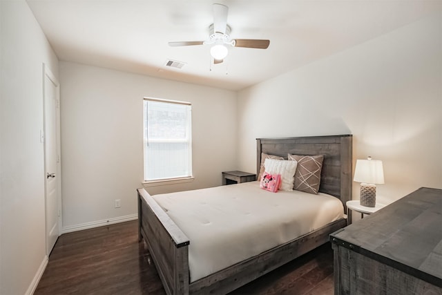 9609 Landon Lake Dr, Pearland, TX 77584 - bedroom featuring dark wood-type flooring, baseboards, and ceiling fan