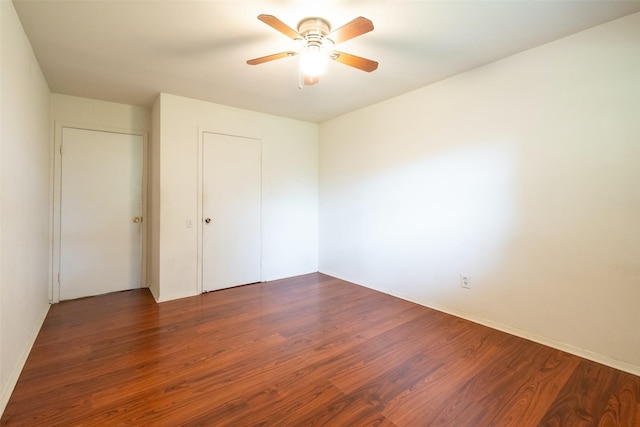 7613 Parker Rd, Houston, TX 77016 - unfurnished bedroom featuring wood finished floors, a ceiling fan, a closet, and baseboards
