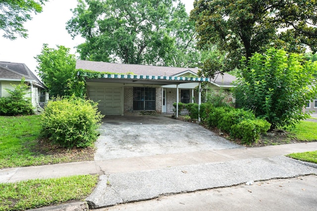 7613 Parker Rd, Houston, TX 77016 - single story home featuring an attached garage, concrete driveway, and brick siding