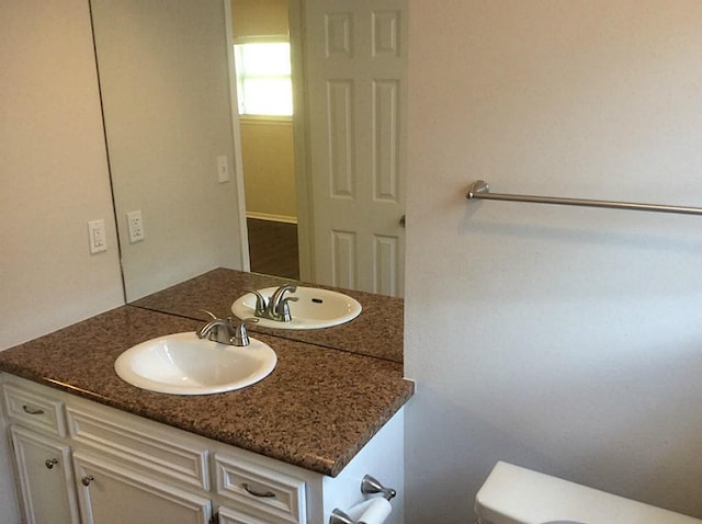 5 Lazybrook St, Angleton, TX 77515 - bathroom featuring vanity and toilet