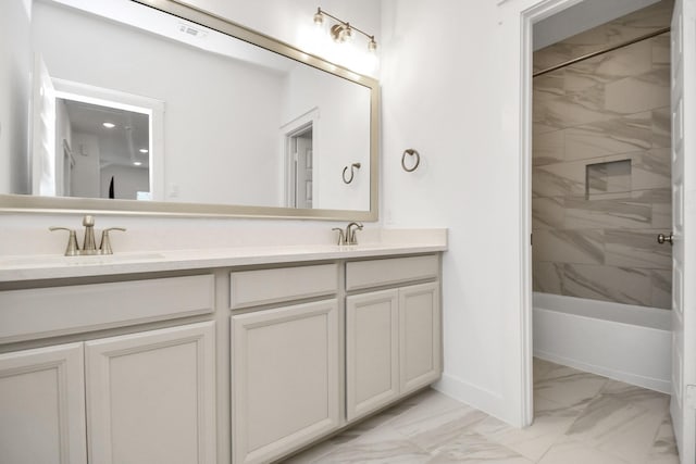18511 Adventurous Way, Cypress, TX 77433 - bathroom featuring marble finish floors, double vanity, baseboards, and shower / tub combination