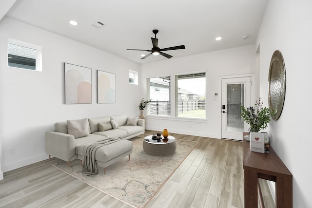 18511 Adventurous Way, Cypress, TX 77433 - living area featuring ceiling fan, light wood-style floors, baseboards, and recessed lighting