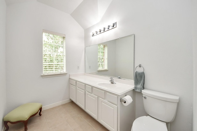 11401 Starlight Bay St, Pearland, TX 77584 - bathroom with plenty of natural light, vanity, vaulted ceiling, toilet, and tile patterned floors
