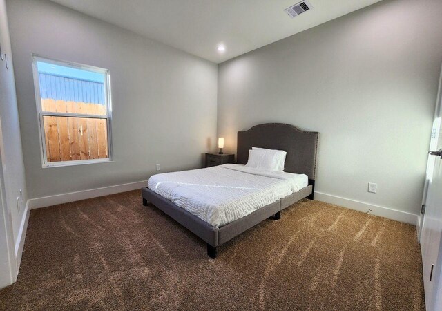 615 Northew St Unit J, Houston, TX 77091 - carpeted bedroom with baseboards