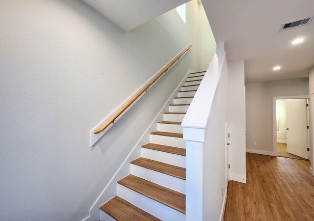 615 Northew St Unit J, Houston, TX 77091 - stairway featuring wood finished floors, recessed lighting, and baseboards