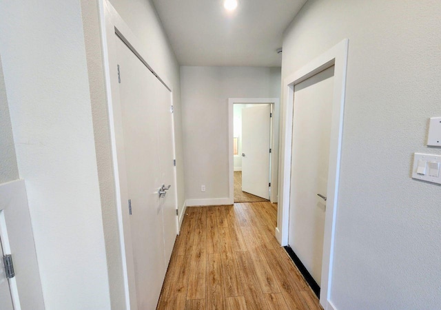615 Northew St Unit J, Houston, TX 77091 - hall with light wood-style floors and baseboards