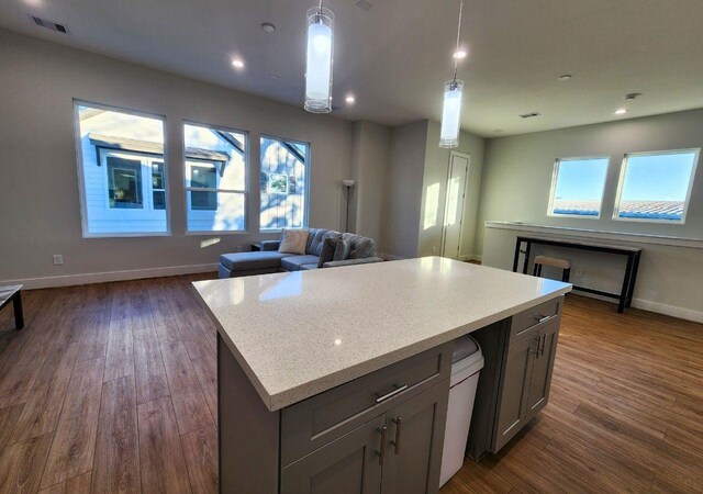 615 Northew St Unit J, Houston, TX 77091 - kitchen with open floor plan, baseboards, dark wood-style floors, healthy amount of natural light, and recessed lighting