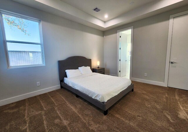 615 Northew St Unit J, Houston, TX 77091 - carpeted bedroom featuring baseboards, recessed lighting, and a tray ceiling