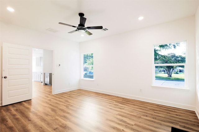 601 S Carroll St, La Porte, TX 77571 - empty room featuring recessed lighting, light wood-style floors, ceiling fan, and baseboards