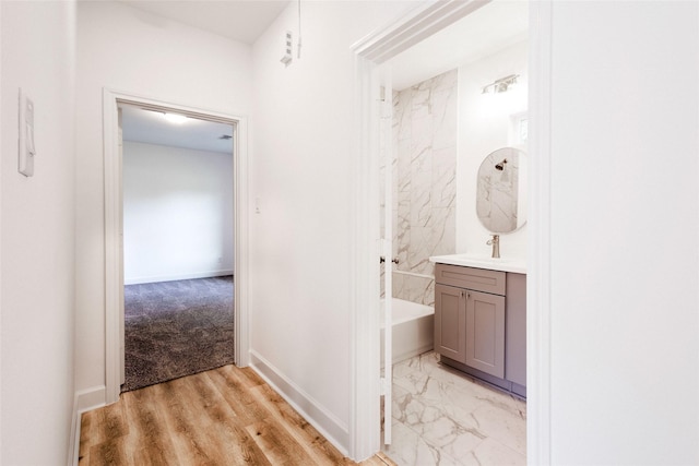 601 S Carroll St, La Porte, TX 77571 - hall with a sink and baseboards